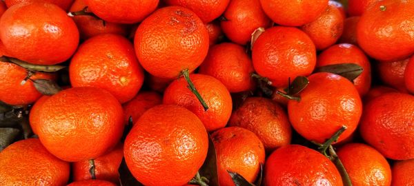 Full frame shot of oranges in market