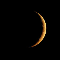 Scenic view of moon against sky at night