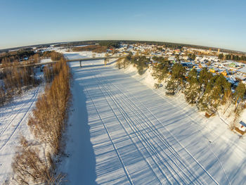 High angle view of frozen river against clear sky