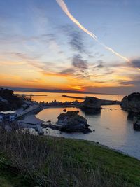 Scenic view of sea against sky during sunset