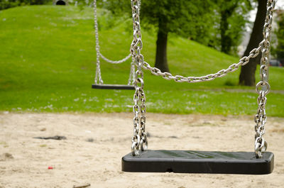 Empty swing in park