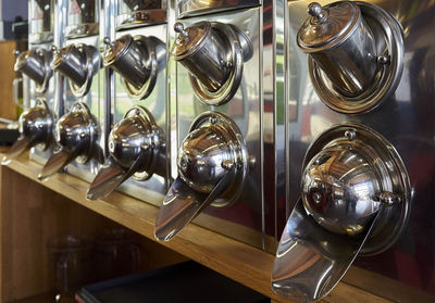 Close-up of wine glasses on table