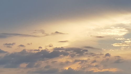 Low angle view of clouds in sky during sunset