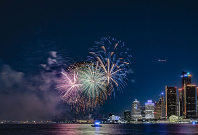 Firework display at night