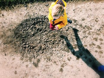 Close-up of woman standing on wall