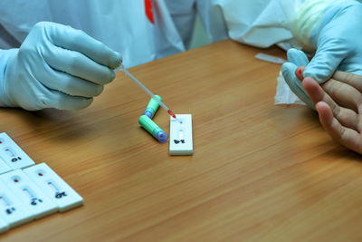High angle view of people on table