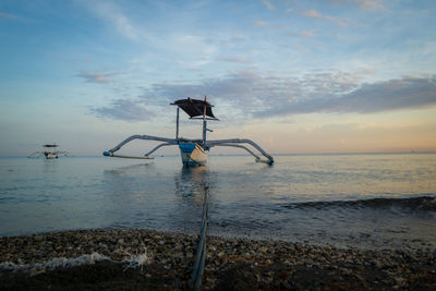 Fisherman traditional boats at lovina beach, bali, indonesia.