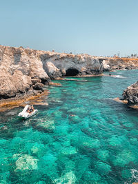 Scenic view of sea against clear sky