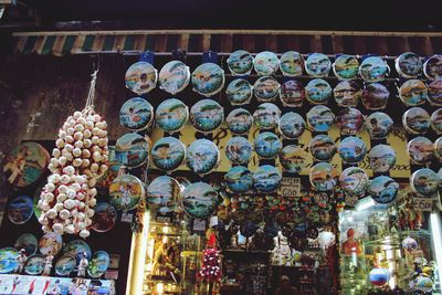 Low angle view of decorations for sale in store