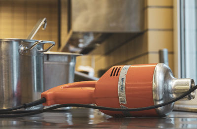 Close-up of machine on table at home