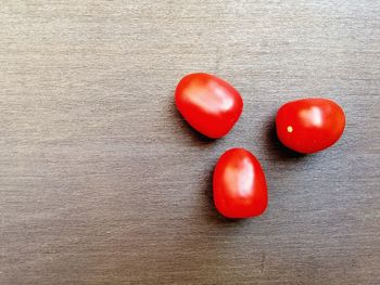 High angle view of cherry tomatoes on table