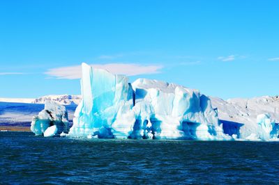 Panoramic view of frozen sea against sky