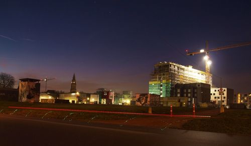 View of city lit up at night