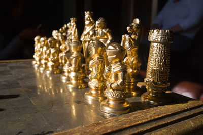 Close-up of chess pieces on table