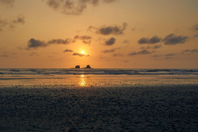 Scenic view of sea against sky during sunset