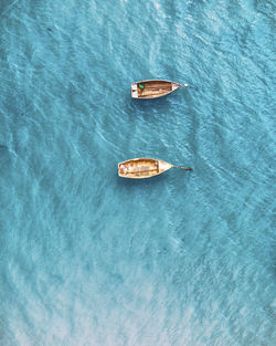 High angle view of empty boat floating on sea
