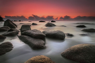 Scenic view of sea against sky during sunset