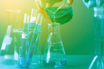 Close-up of glass bottles on table