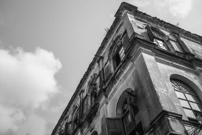 Low angle view of old building against sky