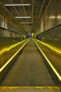 Interior of illuminated railroad station