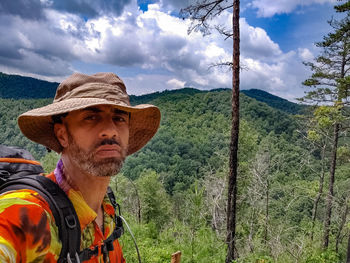 Portrait of man against sky