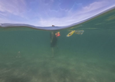 Woman swimming in sea