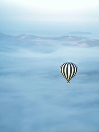 Hot air balloon flying in sky