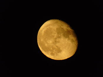Scenic view of moon against clear sky at night