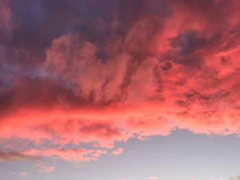 Low angle view of dramatic sky during sunset