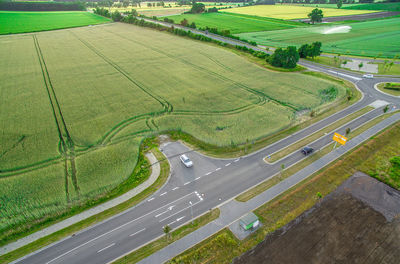 High angle view of road amidst field