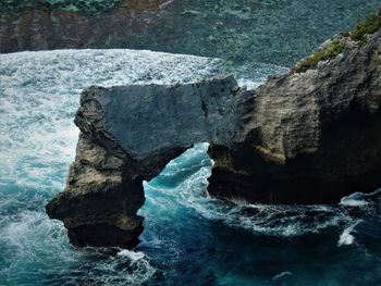 Scenic view of rock in sea