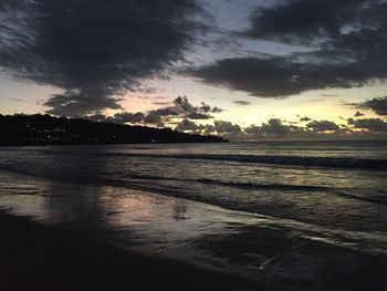 Scenic view of sea against sky at sunset