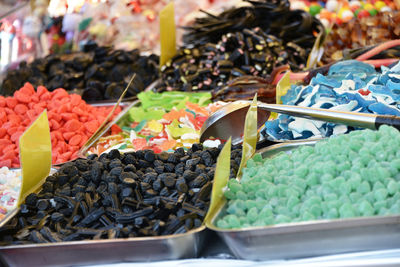 Close-up of multi colored vegetables for sale in market stall