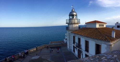 View of sea against clear blue sky