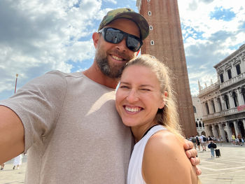 Couple taking selfie at st marco square in venice