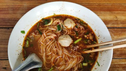 Close-up of soup served on table