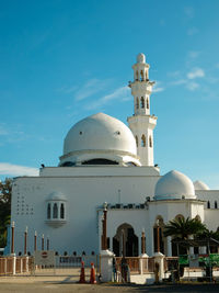 The view of a white floating mosque in kuala ibai, terengganu, malaysia.