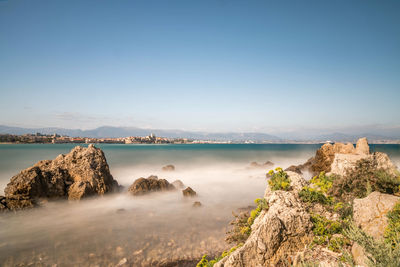 Scenic view of sea against clear sky