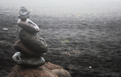 Close-up of stone stack on rock