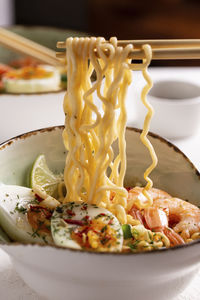 Traditional asian food, ramen soup with shrimps