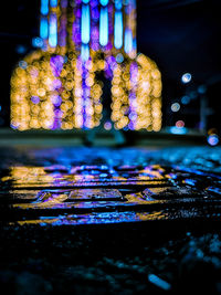 Close-up of illuminated lights at night