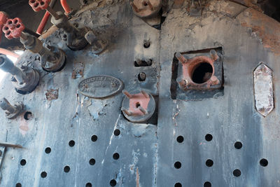 Old abandoned rusty steam locomotive interior