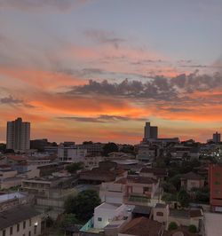 High angle view of buildings against sky during sunset