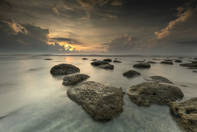 Scenic view of sea against sky during sunset