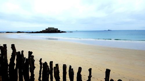 Scenic view of beach against sky