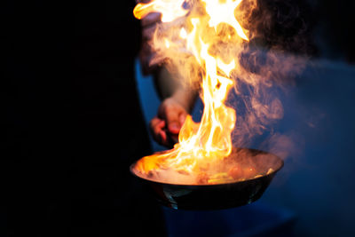 Close-up of burning candle