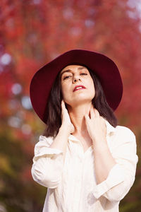 Portrait of a young woman looking away