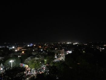 Illuminated cityscape at night