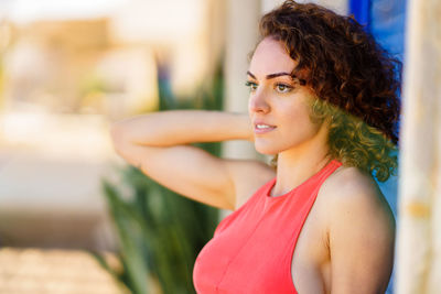 Close-up of young woman looking away