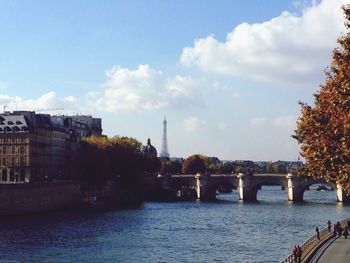 Bridge over river against blue sky